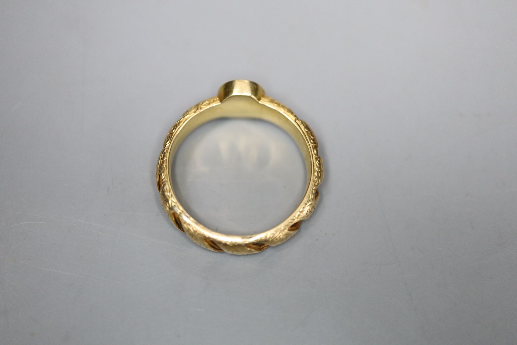 A Victorian gold memorial ring, formerly hair set, with engraved monogram, 4.1 grams